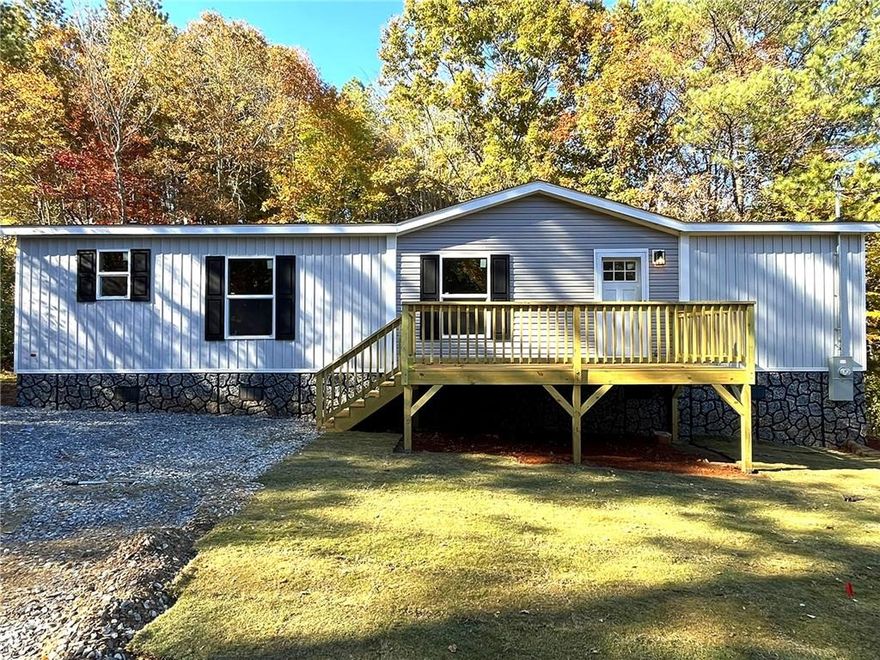 Brand new 2025 manufactured home on a permanent foundation. This is not your entry level baseline model, this one has all the upgrades. Large open concept floor plan with accent walls, and upgraded trim package. Kitchen upgrades include extra tall cabinets, kitchen island , stainless steel appliances, stainless  sink, tile backsplash, and custom coffee bar. Special lighting package with recessed lighting throughout the house. Master bath has a large double vanity. Great plot of land with large front and back yard. More energy efficient HVAC duct work run through the attic instead of crawl space. Convenient location just a mile from Yellow Creek Rd and 4 Mile Rd. Agents appraisal is attached in docs and title is retired.