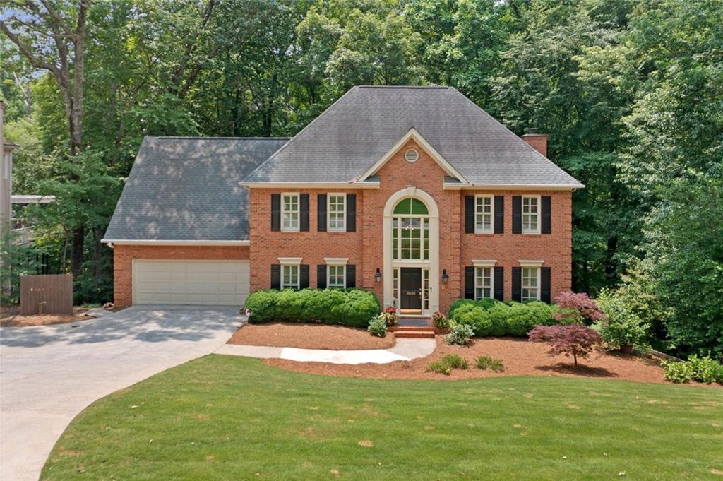 Welcome to 3638 Sope Creek Farm in the highly sought-after East Cobb neighborhood of Sibley Forest! Upon entering this beautifully well maintained home you will find an impressive two story foyer, formal dining room, family room, living room, a well appointed Chef's kitchen and gleaming hard wood floors throughout! The kitchen boasts granite countertops and stainless steel appliances and an incredible floor to ceiling custom wine cooler! The spacious family room has a fireplace with gas logs and custom built in shelves. Doors open from both the kitchen and family room to a huge screened porch with a cozy fireplace, additional dining space overlooking a tranquil wooded backyard. The upper level has a large primary bedroom, a custom renovated bathroom with separate shower and two separate walk in closets! A secondary bedroom has an en-suite bathroom and two other bedrooms share a Jack/Jill full bathroom with a double vanity. The terrace level boasts incredible 14 Ft ceilings, something you would only find in new construction! It is an entertainers dream with a recreation area, media space and a beautiful custom built bar. There is a generous fifth bedroom and full bath, room with gym equipment and extra storage. Step outside to the private lower deck featuring an oversized hot tub overlooking the peaceful wooded yard and creek. Walk down the pathway and find an exterior door with extra storage space and built in shelves, perfect for those Christmas/Holiday decorations! Sibley Forest is one of the most desirable and vibrant neighborhoods in East Cobb with an extremely active HOA, clubhouse, pool, and tennis/pickleball courts. The Chattahoochee River National Forest is steps away from this home with hiking and biking trails reaching Columns Dr. Only minutes to Truist Park, The Battery, I-75, and numerous shopping and dining experiences nearby, this extraordinary home is move-in ready - schedule your tour today!
