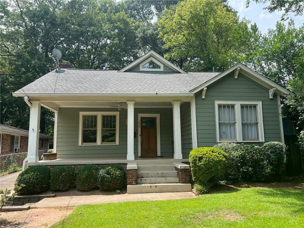 Discover this amazing Candler Park beauty with old-school charm! Enjoy the inviting front porch, pristine hardwood floors, and a spacious kitchen with a breakfast bar. The private primary bedroom and bath, located on the upper level, feature 4 closets, granite countertops, and a double vanity. Additional highlights include crown moldings, recessed lighting, and a large private yard. Located in a vibrant neighborhood with shopping, restaurants, and parks—this home blends classic charm with modern living!