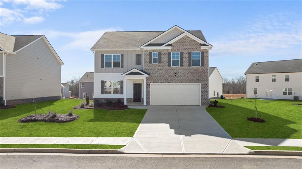 Welcome to the Hayden—a spacious and versatile 5-bedroom, 3-bath home offering thoughtful design and elevated finishes in the heart of Poplar Preserve. This two-story layout features a main-level guest suite with full bath, ideal for multigenerational living or a private home office.
Enjoy open-concept living with a generous family room that flows into the chef-inspired kitchen, complete with marble countertops, subway tile backsplash, stainless steel appliances, gas stove, and a walk-in pantry. A formal dining area adds function and style to the main level.
Upstairs, retreat to a luxurious owner’s suite with large walk-in closet and a spacious en-suite bath featuring a soaking tub, separate shower, and dual vanities. Three secondary bedrooms, a bonus loft space, and a second-floor laundry room round out this smart layout.
Located just minutes from I-85, East Coweta schools, Ashley Park, and Piedmont Newnan Medical Center, this home combines location, comfort, and timeless appeal.