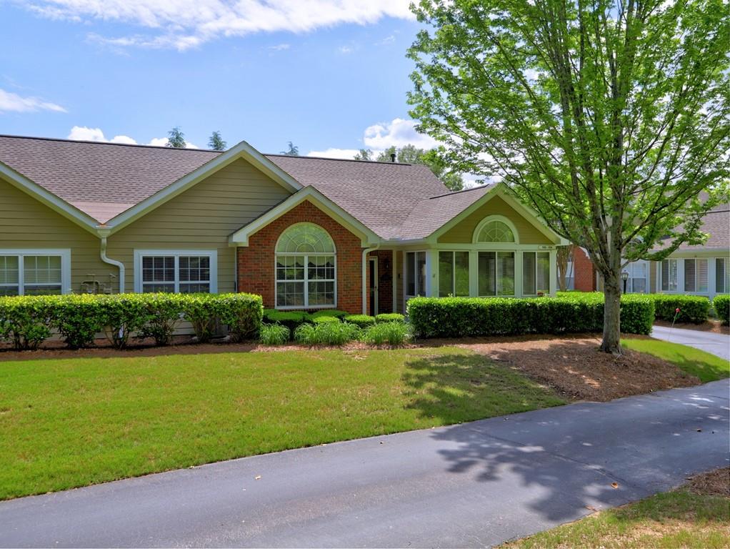 Welcome to this lovely community filled with charm and friendliness! Imagine no more yard work or outside maintenance. This condo is in a great location within the community, with close proximity to the community mailbox, the clubhouse and salt water pool. This community is close to I-575 and I-75, Kennestone Hospital, doctor facilities and Town Center Mall. For your convenience there is a sidewalk from the Vintage Club to Publix, Barnes & Noble, restaurants and much, much more! The open concept of this condo allows for a view from the kitchen to the great room, dining room and sun room. Stone counter tops in the kitchen and master bath. The laundry room is just off the kitchen, along with a large pantry. New roof in 2020 and the HVAC and hot water heater are approx. 6 years old. Enjoy Noonday Creek Trail, just one block away, which has a walking trail and bikes for your enjoyment!