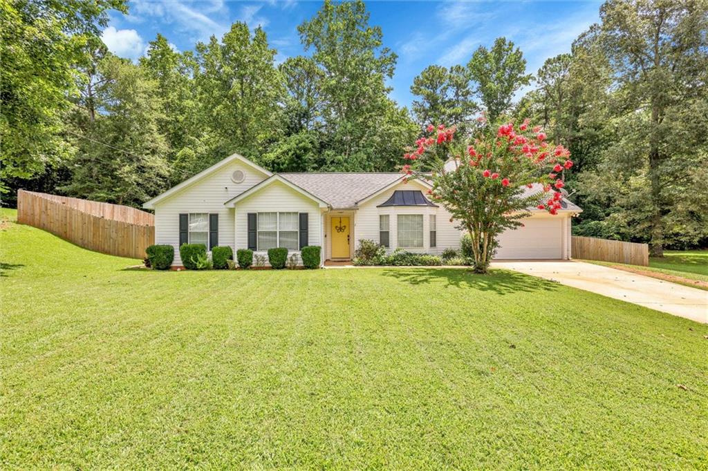 Gorgeous Remodeled Ranch home with tons of upgrades and level, privacy fenced yard! Gourmet kitchen has been updated with quartz countertops, tile backsplash, hardwood flooring, breakfast bar, stainless steel appliances, breakfast area with vaulted ceiling and built in bench seating & storage. A walk-in pantry & mudroom area with tile floor and built in storage has been added to the floor plan and leads to the garage. Main level features hardwood flooring in separate dining area and family room with vaulted ceiling, gas starter fireplace, ceiling fan, & bay window. Newer interior paint, flooring, & updated light fixtures, ceiling fans, & recessed lighting throughout home. Updated bathrooms with new vanities, tile floors, granite countertops, under mount sinks, fixtures, faucets, & mirrors. HVAC (2020) & Roof (2013). Exterior features new covered deck with grill area, office in outbuilding that is climate controlled, & covered RV/ Boat parking in privacy fenced backyard. This ranch home is move in ready and completely upgraded with all the bells & whistles that buyers will love!