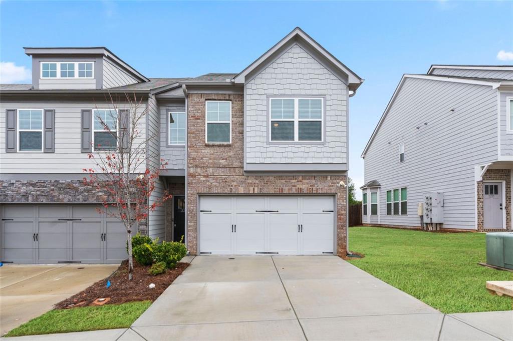 This upgraded end-unit townhome in Conyers offers the perfect combination of style, space, and convenience - all under $300,000. Located at
2231 Bedell Drive, this well-maintained home features 3 bedrooms, 2.5 bathrooms, and a spacious 2-car garage. Step inside to discover
engineered hardwood flooring throughout the main level, an open-concept floor plan, and a bright, inviting living area. The kitchen is equipped
with ample cabinet space, stainless steel appliances-including a Samsung refrigerator-and a large island perfect for entertaining. Upstairs,
enjoy a versatile loft area ideal for an office or secondary living space. The oversized primary suite includes a walk-in closet and en-suite bath.
Two additional bedrooms and a laundry room with a brand-new washer and dryer complete the second floor. Outside, the fenced-in backyard
offers privacy and space to relax or entertain, with a private rear exit for added convenience.