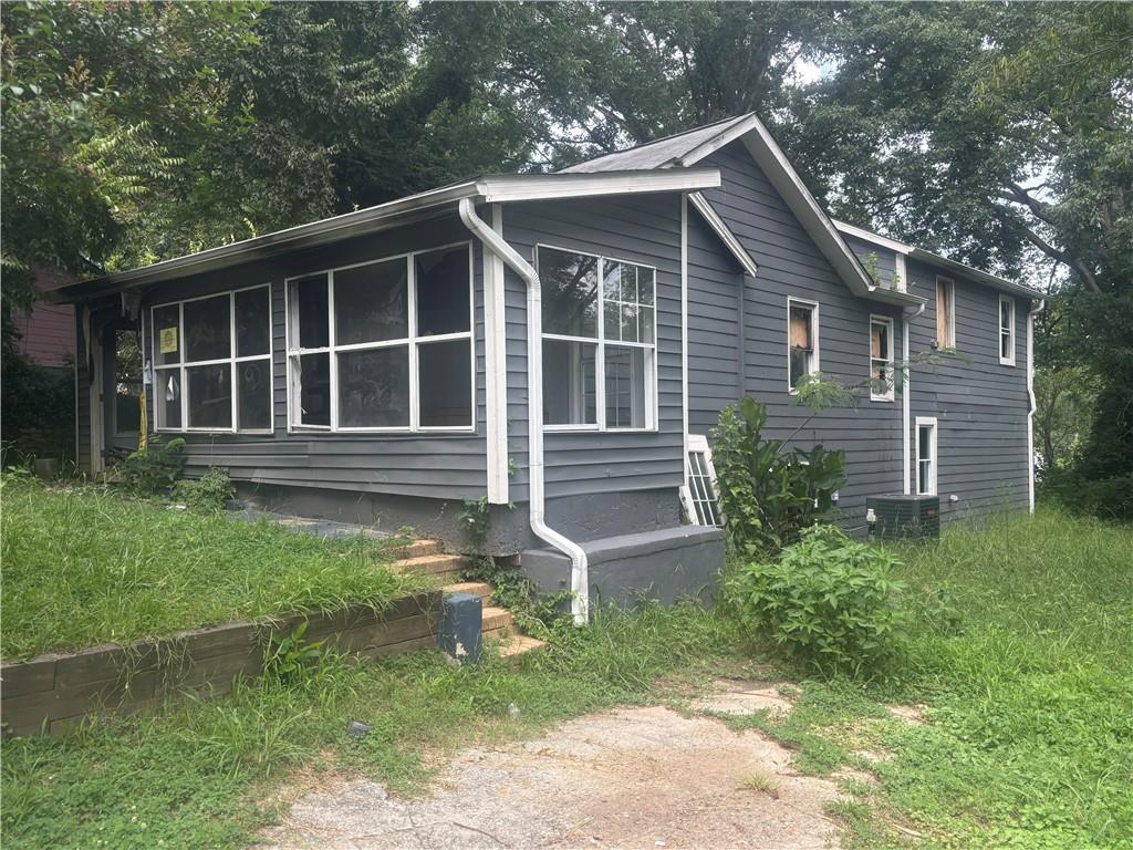 Fire-damaged property with strong investment potential in the heart of Atlanta! 2387 Saint James Dr SE is a two-story home previously operated as a PadSplit and now offers a blank canvas for a full rehab or redevelopment. Property is currently vacant and boarded. Investor-friendly area with new construction and full renovations nearby. Zoned R4. Sold as-is, where-is. No disclosures. Buyer to verify all details.