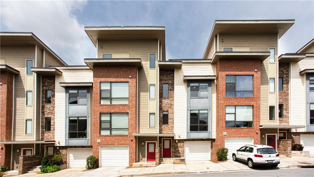 This bright, spacious, serene, plant-filled home is perfect to enjoy the best of beltline living. The home is 1510 square feet split over three floors. 1st floor has a 2-car tandem garage and an exercise room. 2nd story is a fully open concept facilitating seamless interactions across the gourmet kitchen, dining room, and the spacious family/living room. It also has a bathroom and a large balcony that overlooks the community pool. 3rd floor includes 2 bedrooms with their own walk-in closets and full bathrooms. Both bedrooms have blackout blinds.
Features hardwood floors, pristine quartz counters, floor-to-ceiling windows, stainless steel appliances, and fiber connectivity. Community amenities include a private pool, BBQ grill, private dog park, and community garden. Lang-Carson Park is across the street and has pickleball/tennis courts, a grass field, a covered skate park/bball court, and a playground for children.
Very walkable neighborhood with a walk score of 80 and a bike score of 83. Steps away from the Beltline and Freedom Park Trail. Close to restaurants/bars/activities in Cabbagetown, Krog St Market, Inman Park, Little Five Points, Ponce City Market, Midtown, and East Atlanta Village. Two grocery stores/shopping centers within 10-15 minute walking distance. Cabbagetown Park (3/4 mile), Grant Park (2 miles via beltline), and Piedmont Park (3 miles via beltline) are also close by. Easy access to 20 and 75/85. Inman Park / Reynoldstown Marta station is 1/3 mile away.