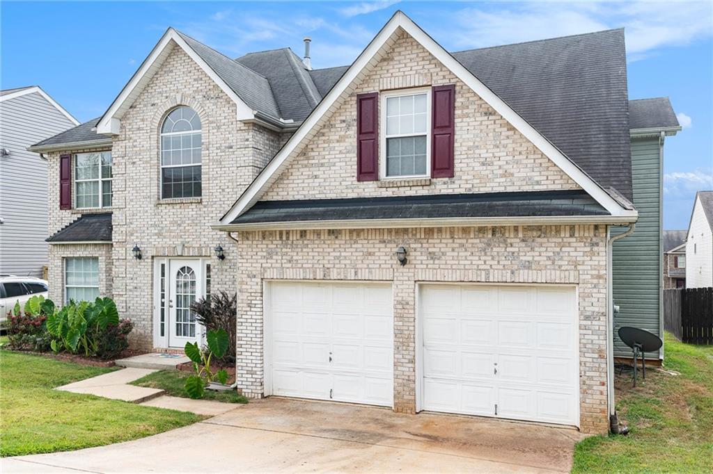 Welcome to this beautifully maintained home in a sought after Hampton community! Offering plenty of space and comfort this property features an inviting open floor plan that's perfect for everyday living and entertaining. This home features new flooring throughout and fresh paint! There are 4BR, 2 full baths, and 2 half baths. There is a formal living and dining room, as well as a family room with a fireplace. Upstairs you will find a huge primary suite. There are vaulted ceilings and a sitting area. This suite has a private staircase to the family room. The garage has been converted to living space, so you can keep it for your home office, gym, or convert it back to a traditional garage. Come and see all this home has to offer!