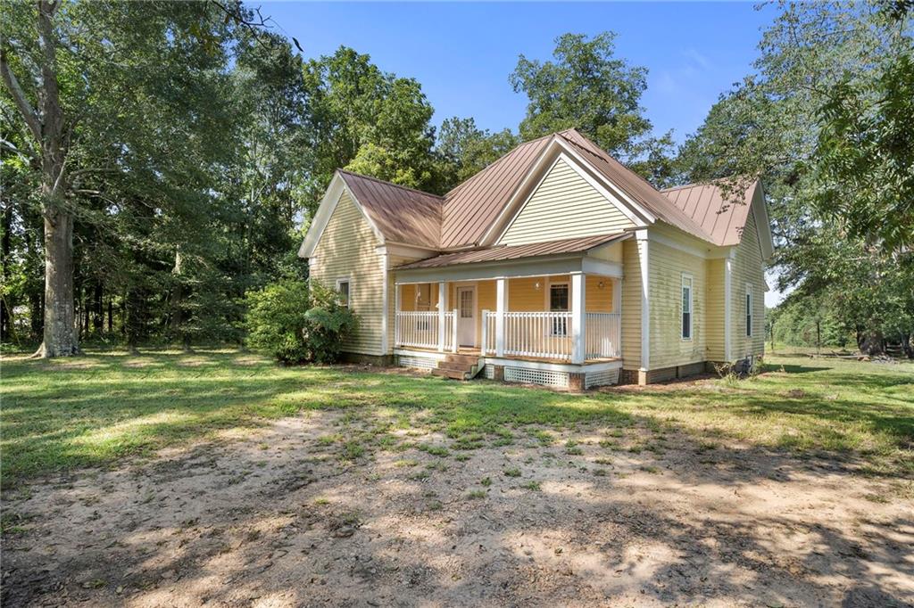 You've found it! !3.4 acres that are pretty cleared up and level! Already circled for your cattle! This gorgeous property is just ready for it's new owner to give it some love! This private oasis just screams tranquility and farm living. The main home looks very spacious with a cozy atmosphere. Priced to sell fast you do not want to miss this grand opportunity to own this gorgeous home. I can already imagine what wonders you can do to this home because it already boasts with high ceilings, pine flooring and lots of natural light beaming through this farm house. Come see it and fall in love!