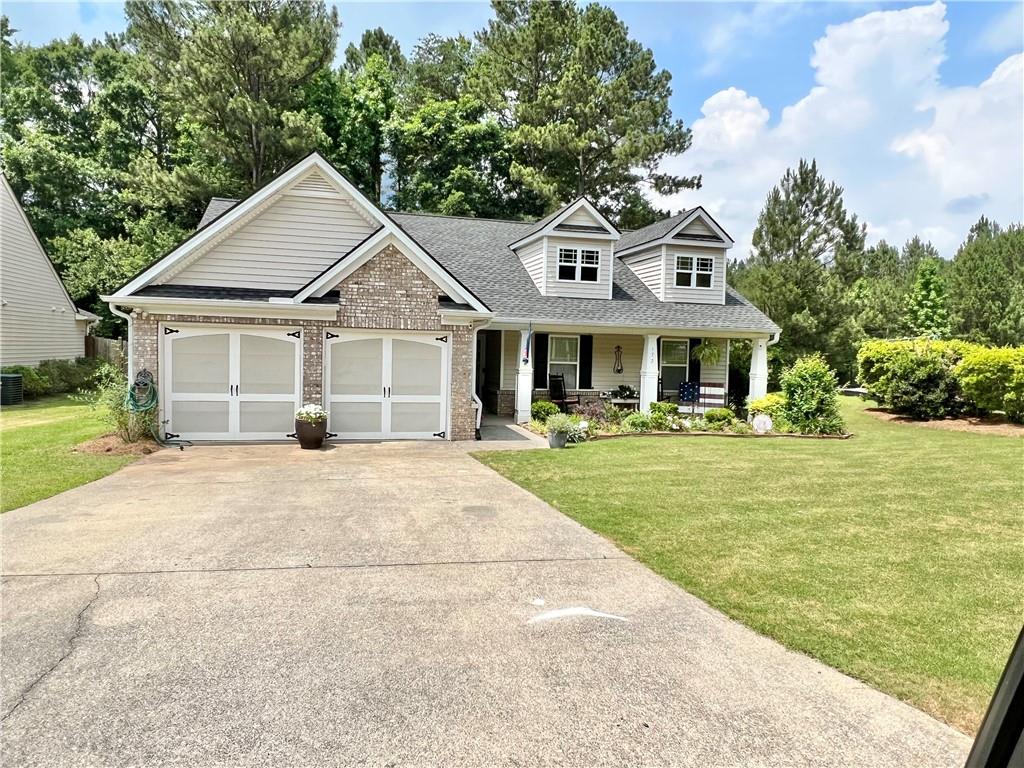 Welcome in to this 3 bed, 2 bath ranch home located in Reid's Plantation in Villa Rica! This home features new paint throughout, hardwoods in the main areas, carpet in the bedrms and tile in the kitchen and laundry areas as well as new LVP floors in the baths. The kitchen features new light fixtures, granite countertops and a new farm sink! The newly fenced backyard is great for the kids and pets and you can enjoy watching them from the covered back patio with an extra concrete area just for the grill. This sub also features a playground and pool for the whole family to enjoy! Plenty of shopping and entertainment within minutes of the sub and only a couple miles to the interstate will make for an easy commute! Come see this home today and let's get you moving!!