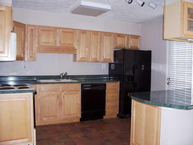 Updated townhome! Renovated open kitchen w/ gorgeous maple cabinets and tile floor. View to a separate dining area. Fresh, clean, neutral paint in main living area! Excellend condition. Priv, fenced patio. W/D incl! Great schools and fabulous location!