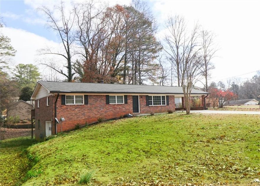 Discover the perfect blend of style and comfort in this beautifully maintained home located in the highly sought-after Marietta area, just minutes from top-rated schools, parks, shopping, and dining. This move-in ready property offers the ideal setup for families, first-time homebuyers, or savvy investors looking for a gem in East Cobb.

Key Features:
3 Bed/ 3 Bath: Spacious and thoughtfully designed for ultimate functionality.
Updated Kitchen: Granite countertops, stainless steel appliances, and walk-in pantry for all your storage needs.
Open floor-plan with with plenty of natural light, LVP flooring, and a huge rear deck great for entertaining gardening, or playtime.

Prime Location: Conveniently situated near I-75, The Battery, and Town Center Mall, ensuring effortless commutes and plenty of entertainment options.
Why You'll Love This Home:
Located in a quiet, established neighborhood with no HOA, this home combines modern updates with classic charm. Zoned for top-performing schools in Cobb County, it’s an opportunity you won’t want to miss!

Schedule Your Tour Today!
Don’t miss the chance to own a slice of Marietta living. Contact us now to schedule a showing before this one is gone!