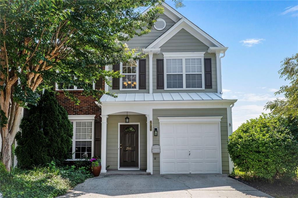 Welcome home to this wonderful end-unit in sought after Park at Windward Village. Just minutes from great schools, shopping, and restaurants. This unit features new flooring, new countertops, and all new interior and exterior paint! You will love the open floorplan with the kitchen as the centerpiece of the main floor. 2-story formal living room with large built-in bookshelves, separate dining room, and family room with gas fireplace. The unit offers additional kitchen storage and large eat in counter unique to Windward Village. From the kitchen, walk out onto your private patio. Perfect for your garden and summertime BBQ's! Upstairs is a large master bedroom with vaulted ceilings. Primary bathroom features new floors, new countertops, and soaking tub. Two guest bedrooms share the guest bath with new floors and vanity. Need to cool off this summer? Take a dip in the large community pool with plenty of shaded seating. Don't miss the community playground for the kiddos.