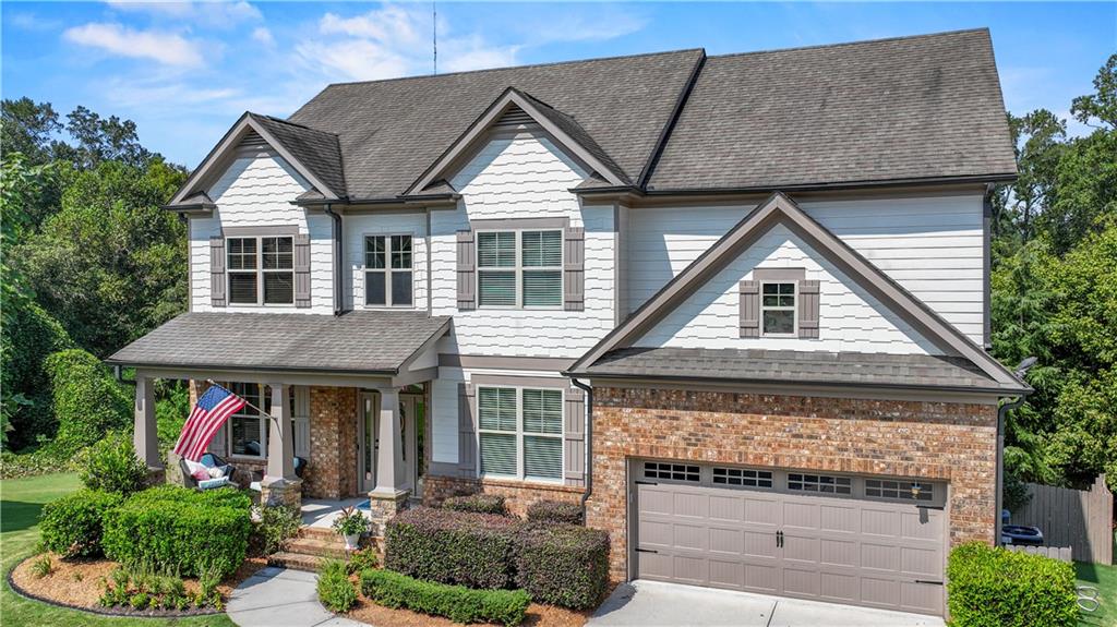 Welcome to your dream home in the highly sought-after Riverstone Park Subdivision! This beautifully maintained 5-bedroom, 4-bathroom home offers nearly 4,700 sq ft of living space, nestled in a quiet cul-de-sac and backing up to the peaceful Mulberry River. Enjoy the perfect blend of luxury and functionality with a full finished basement - ideal for entertaining guests or cozy family nights in featuring a recreation room and a dedicated theater room, exercise room, workshop, and unfinished storage area. The main level includes a private office, a separate dining room, and access to a covered back deck overlooking a fenced-in backyard. This back deck offers a serene setting for morning coffee or evening relaxation, large open kitchen that overlooks the backyard and into the open main living area. Upstairs, you'll find four spacious bedrooms, including an oversized master suite with ample space to unwind. An open family room provides additional living space perfect for a play area, reading nook, or secondary lounge. Riverstone Park is an active, family-friendly community with amenities for everyone including a large swimming pool, two playgrounds, tennis courts, and pickleball courts, along with neighborhood events planned throughout the year for both kids and adults. This is more than just a home, it's a lifestyle. Don't miss your chance to own this one-of-a-kind property in one of Braselton's most vibrant neighborhoods!
