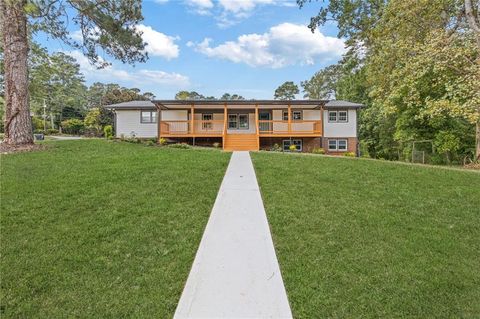 Photo of 551 Briggs Circle SW, Lilburn, GA 30047 (MLS # 7649312)