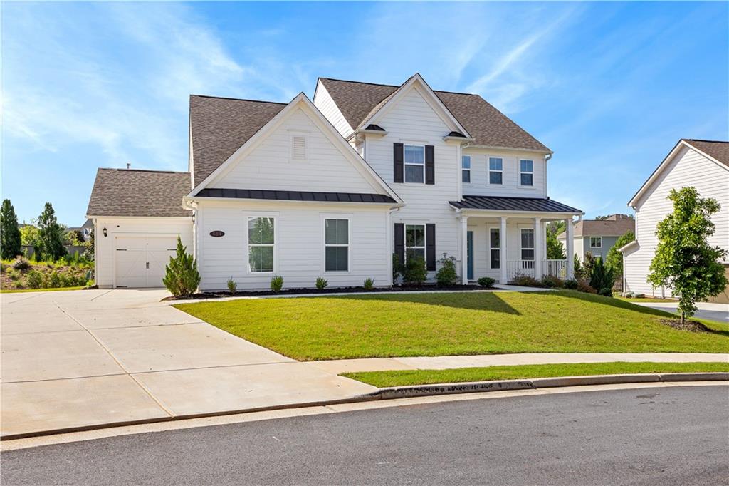 Live the Peachtree City Lifestyle in This Like-New Dream Home! Welcome to this beautiful, spacious 5-bedroom, 4.5-bath home in the heart of Peachtree City, where charm meets convenience. With 3,658 square feet of thoughtfully designed living space, this home offers room to live, work, and entertain in comfort and style. Step inside this like new home to discover a bright and open layout featuring a main-level office, cozy gas log fireplace, and a light-filled sunroom perfect for morning coffee or relaxing evenings. The chef's kitchen includes a large walk-in pantry, modern appliances, and plenty of space to gather. Guest room or secondary bedroom on main as well. Retreat to the oversized primary suite with a spa-like bathroom, complete with his and her walk-in closets. Every bedroom offers generous space and comfort for family or guests. Upstairs you will also find three secondary bedrooms and spacious laundry room. Outside, enjoy direct access to Peachtree City's famous 100+ miles of golf cart paths-just a short ride to restaurants, parks, and shopping. The home also features a 2-car garage plus a dedicated golf cart garage, making it easy to explore the city in true PTC style. Don't miss this rare opportunity to own a like-new home in one of Georgia's most beloved communities. Schedule your private showing today!