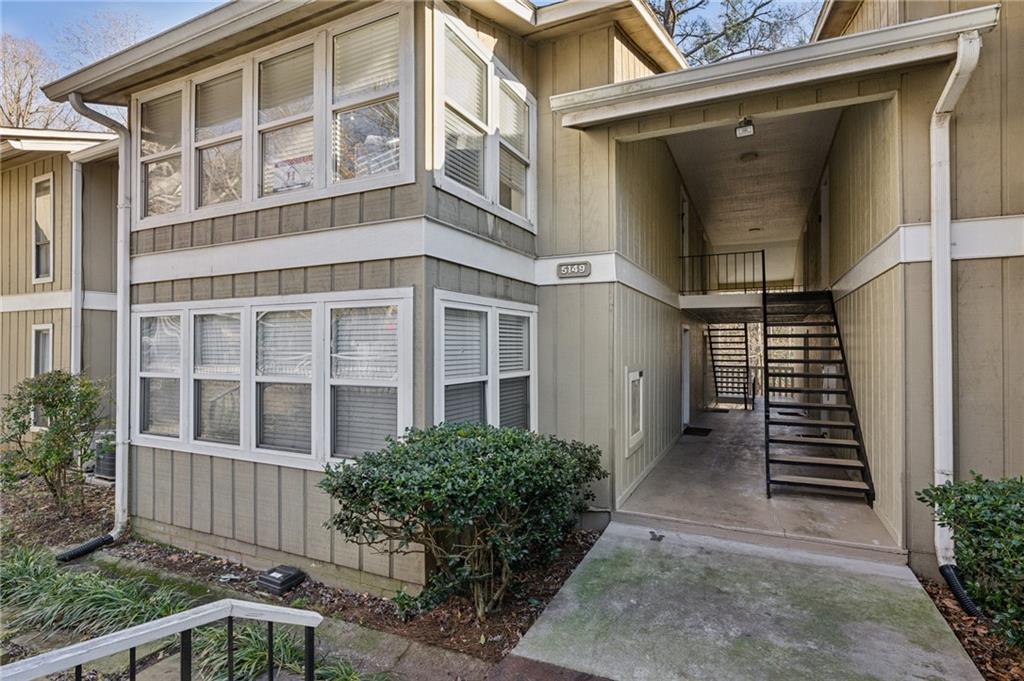 The most spacious condo located at the Summit close in Sandy Springs and easy access to Buckhead. Open living room with a bonus sunroom perfect for a home office or den setting. Lovely wooded and private setting through picture windows. Separate dining room leads into kitchen with newer appliances. Laundry closet just beyond the kitchen (washer/dryer) not included. New paint and new carpet throughout. Two generous sized bedrooms and closet space perfect for roommates. Newer bathroom fixtures. Delightful community with a pool, tennis court, dog park. A wooded oasis with lovely topography in the middle of it all.