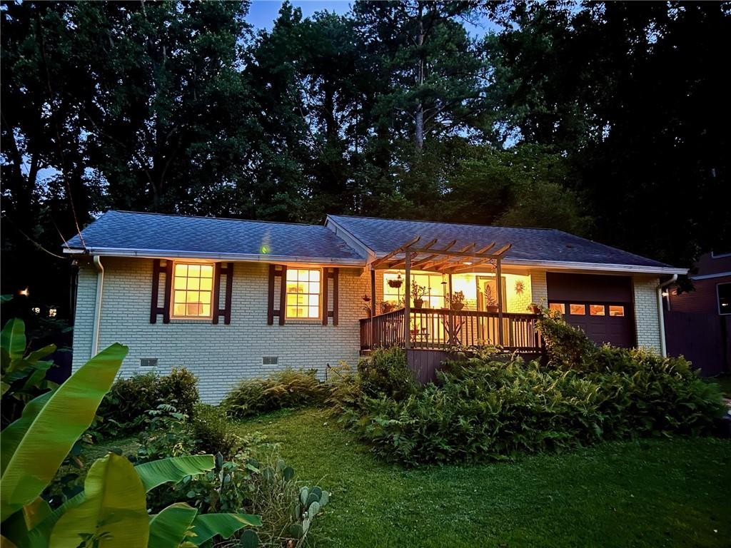 You found your haven! Homeowner lovingly occupied ranch home with hardwood floors throughout. 3-bedroom (one has been converted into an open office off the living room) 2 full baths (one ensuite), 5 closets, luminous kitchen with loads of storage and counter space. Comfortable breakfast bar opens up to dining room. Convenient garage access off kitchen.
Separate bright, spacious laundry room.
After a long day, unwind or entertain on your 2 decks overlooking your own lush tropical oasis. Fenced backyard. Serene privacy and yet close to it all! Minutes from 85, 285, midtown, international shopping and restaurants, the new downtown Doraville and Assembly! (You may even get discovered ;)
2022 new HVAC, 2023 new water heater, 2018 new architectural 30-yr roof.