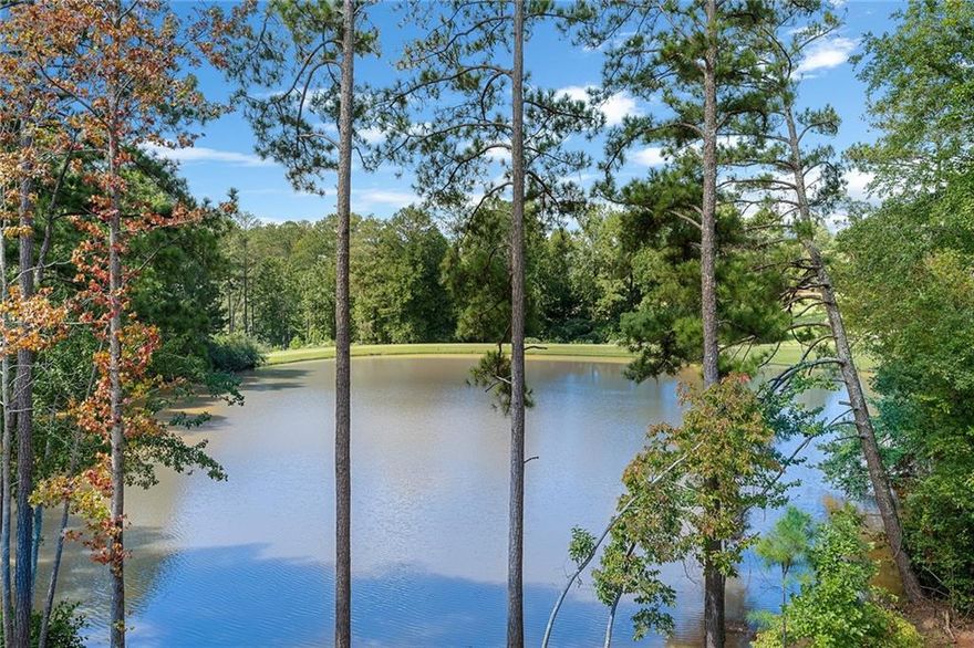 Rare opportunity to purchase extraordinary lot in The Manor Golf and Country Club.  1.8 acres is located at the end of a cul-de-sac, on a picturesque pond, and overlooking three golf fairways.  Lot 75 is the location of the original homesite of the original Manor land owner.  Waterfront dock.  Gated neighborhood.  Unparalleled amenities include two Clubhouses, indoor and outdoor pools, indoor and outdoor tennis courts, fitness center, Tom Watson designed Golf Course.  Sidewalks throughout community.   Close to the Greenway, shopping, restaurants.  Great school district.  Property purchase requires membership at Country Club AND HOA Dues.  The views from this lot are spectacular