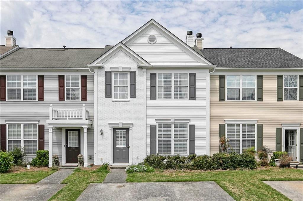 Wonderful opportunity in the heart of Kennesaw. Close to KSU, Kennesaw Mountain, Shopping, and restaurants. Beautiful 3 Bedroom, 2.5 bath townhome in Cedarlake with a BRAND NEW ROOF. Cozy main level with the kitchen and dining room overlooking a spacious family room with gas fireplace. Walk out the sliding doors to a private backyard with a direct view of the lake. Enjoy a cup of coffee or a glass of wine while listening to the serene sounds of the lake fountain. Upstairs you'll find 3 bedroom, 2 baths, and convenient upstairs laundry. The sizeable master bedroom has it's own bath with double vanity and walk in closet. The other 2 bedrooms share a hallway bath. The central location offers you all the best that Kennesaw has to offer.