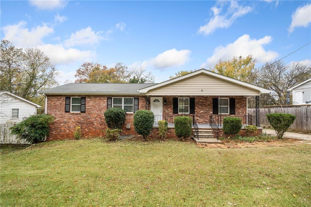 This beautifully renovated two-sided brick ranch on a basement boasts a perfect blend of modern amenities and classic charm, offering an ideal living space. All of the big ticket items have been taken care of for the new owner: plumbing, electrical, roof, new water line from street to the house. Cook to your heart’s content in the updated kitchen with stainless steel appliances, stone countertops and ample counter space. The bathrooms have been renovated and there is a half bath with a utility sink in the basement. Enjoy the continuity and warmth of all laminate wood flooring on the main level, creating a cohesive and inviting atmosphere. The spacious daylight basement includes a convenient boat door, half bath, and an abundance of storage shelves, ideal for hobbies or creating additional living space. A newly rebuilt 320 sq. foot shed offers additional storage or workshop potential. The backyard is partially fenced and can easily be completed. This home is truly move-in ready, combining modern updates with classic style. Conveniently located near I-75 for easy interstate access. Don't miss the opportunity to make this stunning property yours!