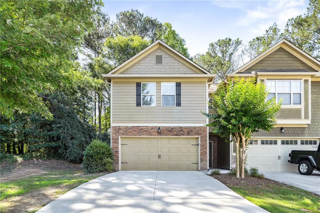 Welcome home to this beautifully updated 3-bedroom, 2.5-bath townhouse in Woodstock. With modern finishes, a low-maintenance design, and a prime location near Hobgood Park and Lake Allatoona, this home is the perfect fit for today’s renter. The open-concept main level features a spacious living room that flows into the dining area and kitchen—ideal for entertaining or everyday living. Recent upgrades include new luxury vinyl plank flooring and freshly painted interiors, creating a bright, modern atmosphere throughout. Upstairs, the primary suite offers a relaxing retreat with a spa-inspired bathroom featuring double vanities, a soaking tub, and a walk-in shower. Two additional bedrooms share a full bath, giving you flexibility for family, roommates, or a home office. Step outside to enjoy your private back patio, perfect for grilling, lounging, or soaking up the sunshine. The home has been meticulously maintained, giving you peace of mind and comfort from the start. Located just minutes from shopping, dining, top-rated schools, Hobgood Park, and Lake Allatoona, you’ll love the convenience and endless opportunities for recreation. Quick access to major roads makes commuting easy. This home is available for immediate move-in, and small pets are welcome! Washer and Dryer can be provided upon request at no additional charge.