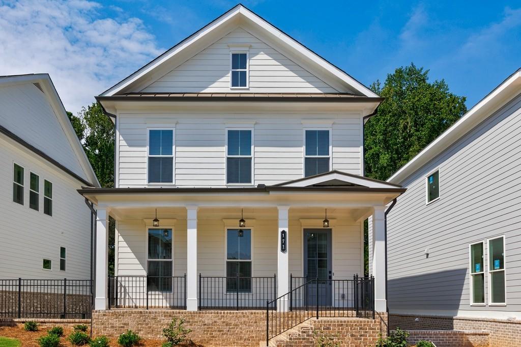 Welcome to Brackley - Cumming's premier new community where modern living meets convenience and lifestyle! Just one mile from GA 400 and minutes from City Center, this home offers unbeatable access to shopping, dining, and entertainment, with Lake Lanier only a short drive away. Residents also enjoy fantastic community amenities including a sparkling pool and a dog park, perfect for both relaxation and recreation. Step inside The Greenville, a thoughtfully designed single-family home with open-concept living and high-end finishes throughout. The terrace level offers a private bedroom with a full bath, perfect for guests or a quiet home office. On the main level, soaring 10-foot ceilings and 8-foot doors create a bright, airy feel. The chef's kitchen is a showstopper, featuring a massive island, 42" white cabinetry, herringbone tile backsplash, stainless steel farmhouse sink with sleek black hardware, and a seamless flow into the spacious family room with a modern linear fireplace. A large deck off the back is ideal for entertaining or simply enjoying a peaceful evening outdoors. Upstairs, retreat to the luxurious primary suite with a spa-like bath boasting dual vanities, a freestanding tub, a separate glass shower, and an oversized walk-in closet. Two additional bedrooms share a stylish hall bath, while the laundry room is conveniently located nearby. Even better lawn care is included with the HOA, giving you more time to relax and enjoy all that Brackley has to offer. This home combines elegance, comfort, and low-maintenance living in one of the most desirable new communities in Cumming. Don't miss your chance to lease this beautiful home schedule your private tour today!