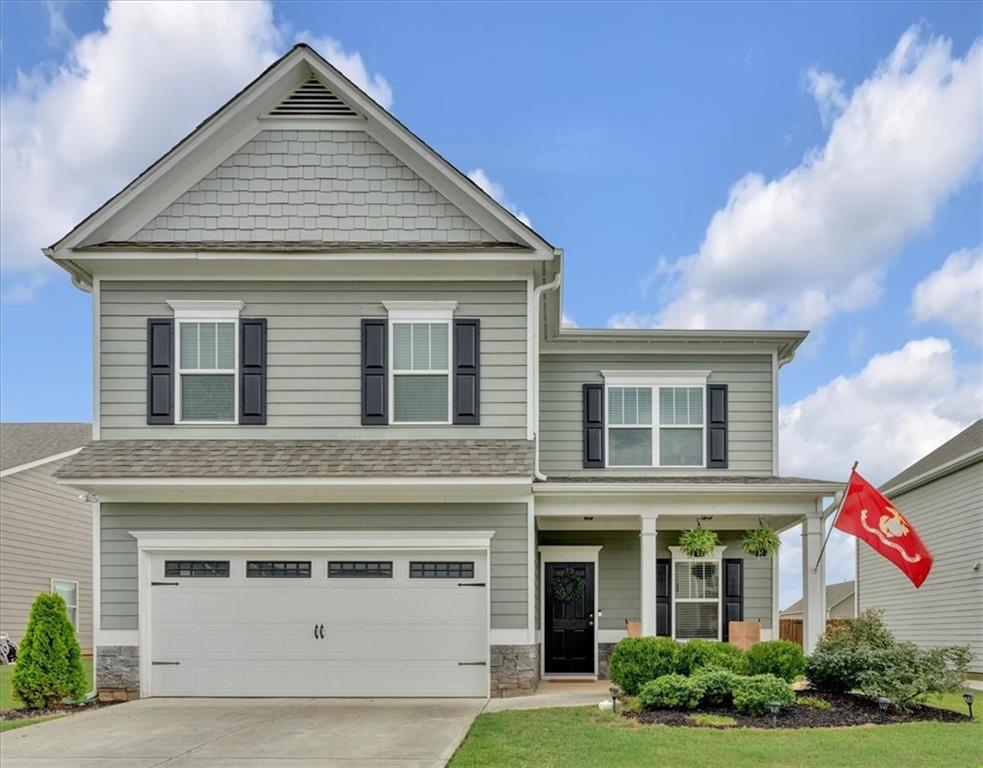Welcome to this inviting 4-bedroom, 3-bath home in Cartersville, just minutes from shopping, dining, and schools. A welcoming front porch sets the tone for this charming property, while inside you’ll find an open main living area with newly installed wide plank luxury vinyl flooring, built-in shelving, and a cozy fireplace.
The kitchen is designed for both function and style, featuring an oversized island, stainless steel appliances, and ample cabinet space. Upstairs, the oversized primary suite includes a tray ceiling, private en-suite bath, and a large walk-in closet. Three additional bedrooms provide plenty of space for family, guests, or a home office. Outdoors, enjoy a fenced-in backyard, perfect for pets or gatherings, along with a storage building for added convenience. Combining comfort, space, and location in the desirable Cartersville City School District, this home is move-in ready and waiting for its next owner.