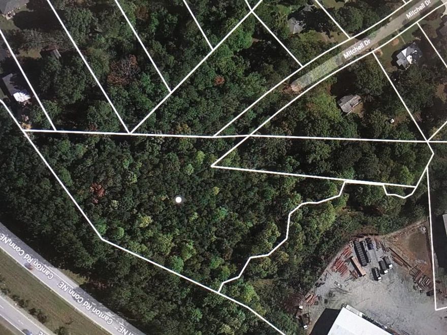 Excellent Opportunity on this 1.93 acre lot currently zoned LI.  Lots of possabilities including residential build site. Located ate the end of the street.  Esay access to downtown Marietta, I-75 and I-575.  Co-agent is owner and acting as principle.