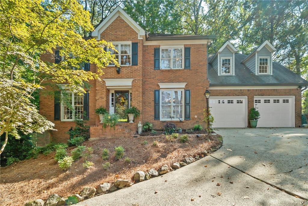 Welcome to Arbor Bridge!
Nestled in one of East Cobb’s favorite neighborhoods, this charming gem offers more than just a home, it’s a lifestyle. Located in the award-winning Lassiter High, Mabry Middle, and Rocky Mount Elementary school district, Arbor Bridge is alive with energy and community spirit. From the bustling swim team and year-round tennis to festive seasonal parties, children’s parades, and book clubs, there’s something here for everyone.
Step inside to find a home filled with warmth and character. Refinished hardwood floors, crown molding, and timeless details set the stage. The fireside great room is the heart of the home, flowing into a cozy study, cheerful sunroom, and bright, welcoming kitchen, perfect for both daily living and entertaining. Step out from the sunroom onto the back deck and discover your own private, landscaped retreat, an enchanting backdrop for morning coffee or evening gatherings.
Upstairs, you’ll find five bedrooms and two baths with updates, giving everyone their own space. The full unfinished basement is brimming with potential, whether you dream of a media room, gym, play space, or simply need abundant storage.
Arbor Bridge is ideally located with easy access to schools, grocery stores, shopping, and entertainment. You’re minutes from the Marietta Square, historic downtown Roswell, lively Woodstock, Costco, and the Outlet Shops. This isn’t just a place to live—it’s a place to belong, complete with wonderful neighbors and endless opportunities for connection. Come see why life in Arbor Bridge is so special!