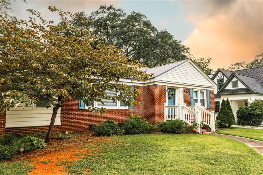 167 W Hightower Trail is the brick cottage you have been looking for! Walking distance to Downtown, the post office, the park and schools. You cannot be this location! The home features two bedrooms and two full bathrooms with a flex space that could be used for whatever you may need. The home has been updated but still maintains charm throughout. A large backyard with mature trees perfect for your pets (and YOU) to enjoy. Schedule your showing to see this home today!