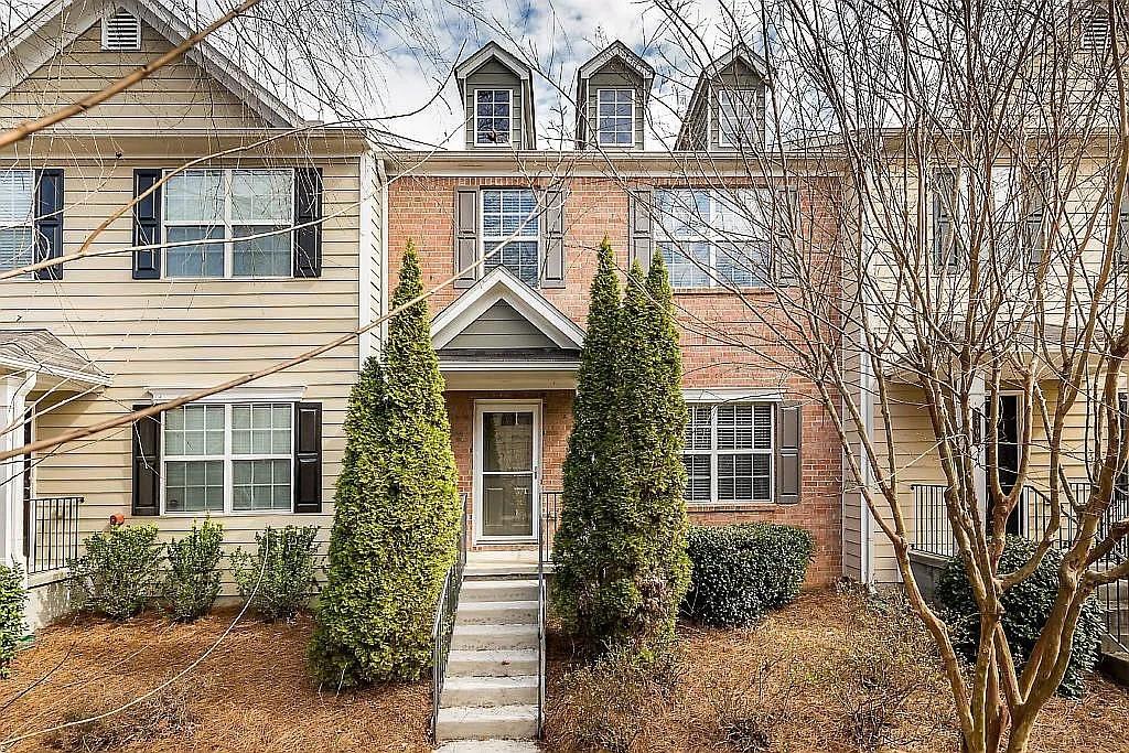 Coming Soon! Welcome home to this beautiful 3-bedroom, 3-bath townhome located just minutes from the Outlet Shoppes at Atlanta, Costco, and Woodstock City Church! Situated in a desirable swim/tennis community, this home offers comfort, convenience, and a great location.
The main level features a bright living room and an eat-in kitchen with a small pantry and access to a private deck — perfect for relaxing or entertaining. Upstairs, the spacious primary suite includes a walk-in closet and private bathroom. Two additional bedrooms, a second full bath, and a laundry room located in the hallway provide ample space and functionality.
Downstairs, you’ll find a finished bonus room ideal for a home office, gym, or extra storage. The home also includes a two-car garage and additional parking in the private driveway.