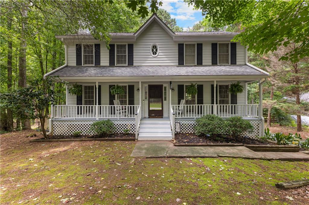 Welcome to this beautifully maintained 3 bedroom, 2.5 bath home nestled in the highly sought-after Starrs Mill High School district in Peachtree City. Offering over 2,050 sq ft of thoughtfully designed living space, this home blends comfort, style, and incredible outdoor amenities on just under an acre. Inside, enjoy a cozy living area with a gas log fireplace, a well-appointed kitchen with a coffee andwine bar, and convenient hall laundry. The spacious primary suite features a luxurious 5-head shower for a spa-like experience. Recent upgrades include new attic insulation, a Rinnai tankless water heater, an attic fan, and fresh exterior paint, ensuring efficiency and peace of mind. Step outside to your private backyard oasis-perfect for entertaining. Relax beside the beautiful pool, have a drink at the built-in poolside bar, enjoy the custom built outdoor shower or stroll around the lined fish pond. There's even a greenhouse for your garden projects. The fenced-in backyard offers privacy and space for pets, play, or simply unwinding. Plus, this home is a stone's throw from the renowned Peachtree City golf-cart paths, with over 100 miles of scenic trails throughout the community-perfect for easy and fun access to shops, parks, and golf courses. Tucked away near Braelinn Golf Club, with all its amenities, and Luther Glass Park. This is a rare opportunity to own a truly special property with unique features and meticulous care throughout. Don't miss your chance to own this exceptional property that perfectly combines lifestyle, location, and luxury-schedule your private showing today and experience everything it has to offer.