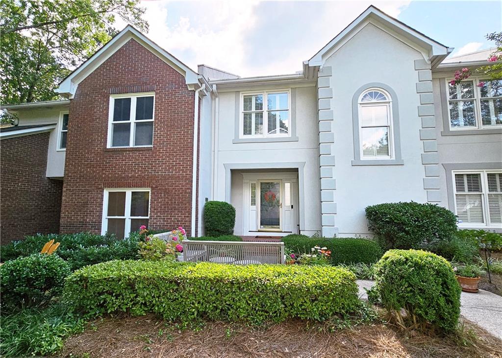 Renovated home is sought after River Oaks. Eat-in kitchen with stainless appliances including refrigerator and wine fridge. Large dining room and family room overlooking deck and wooded privacy. Upstairs features primary suite with updated bathroom, two sinks, separate soaking tub and shower plus custom built ins and large walk-in closet. Two additional bedrooms and one full bath up. The lower level has a large recreation room or media room that connects to the 2-car garage and storage. Fantastic neighborhood amenities include pool, tennis court and dog park plus tons of green space and guest parking. This townhouse is located in an exclusive community convenient to Chastain Park, restaurants and shopping at the Sandy Springs City Center, The Battery and Chattahoochee National Park.