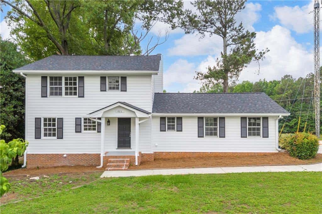 Photo of 4872 Arrowhead Trail West Trl SW, Lilburn, GA 30047 (MLS # 7783476)