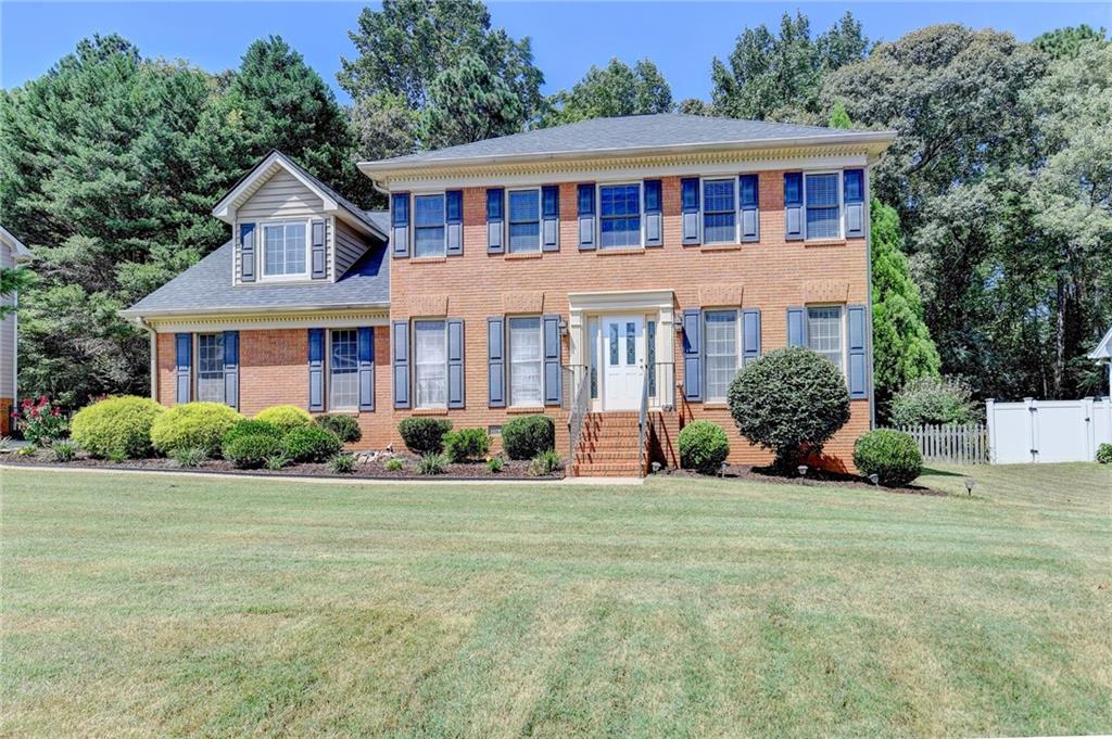 The highly sought-after Brookwood School District, this stunning two-story home offers an exceptional blend of elegance and functionality, making it ideal for modern family living.It has a spacious and inviting layout designed to meet every need. The formal dining room sets the perfect stage for hosting memorable gatherings, while the airy sunroom provides a tranquil retreat to relax. The kitchen is very spacious. The primary suite features a soaking tub, his-and-her vanities, and a walk-in closet. Step outside to your expansive deck overlooking a private backyard. This home offers exceptional design, thoughtful features, and an unbeatable location in Lilburn with the most prestigious Brookwood schools. Every restaurant, supermarket, and other facilities are a short drive away. Easy access to Hwy 78 and Ronald Reagan Pkwy.