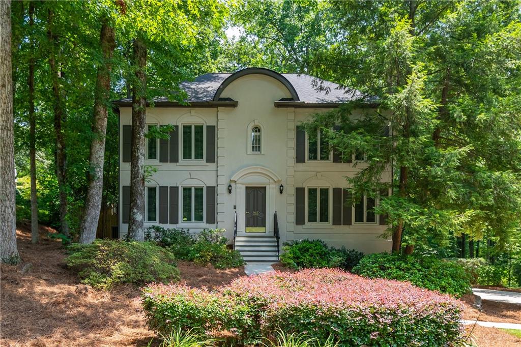 Welcome to 799 Birds Mill SE a rare blend of timeless sophistication, modern updates, and thoughtful design in the heart of East Cobb’s beloved Sibley Forest.
This 4-bedroom, 2.5-bath home with a finished terrace level offers the perfect combination of space, style, and location, just minutes to Truist Park, the city of Atlanta, and a short walk to Sope Creek Elementary and the trails of the Chattahoochee National Forest.
Freshly painted in the ever-classic White Dove (it never lets us down!), this home features newly refinished hardwood floors, brand new carpet, and a new water heater. The main level is designed for effortless living with a spacious fireside family room, a separate living room perfect for a home office, a formal dining room, and a bright kitchen with white cabinetry, a new double oven, and plenty of prep space.
Upstairs, the primary suite is a peaceful retreat with custom closets, a soaking tub, and a separate shower. Three additional bedrooms and a full hall bath offer space and flexibility for family and guests.
The terrace level adds bonus space for a playroom, home gym, or media room plus plenty of storage. Step outside and you’ll find a professionally landscaped backyard with beautiful hardscaping ready for a future firepit, and a screened-in porch perfect for entertaining or unwinding with dinner al fresco.
Meticulously maintained with a newer roof and fresh exterior paint, 799 Birds Mill is more than just move-in ready, it’s ready to welcome you home.