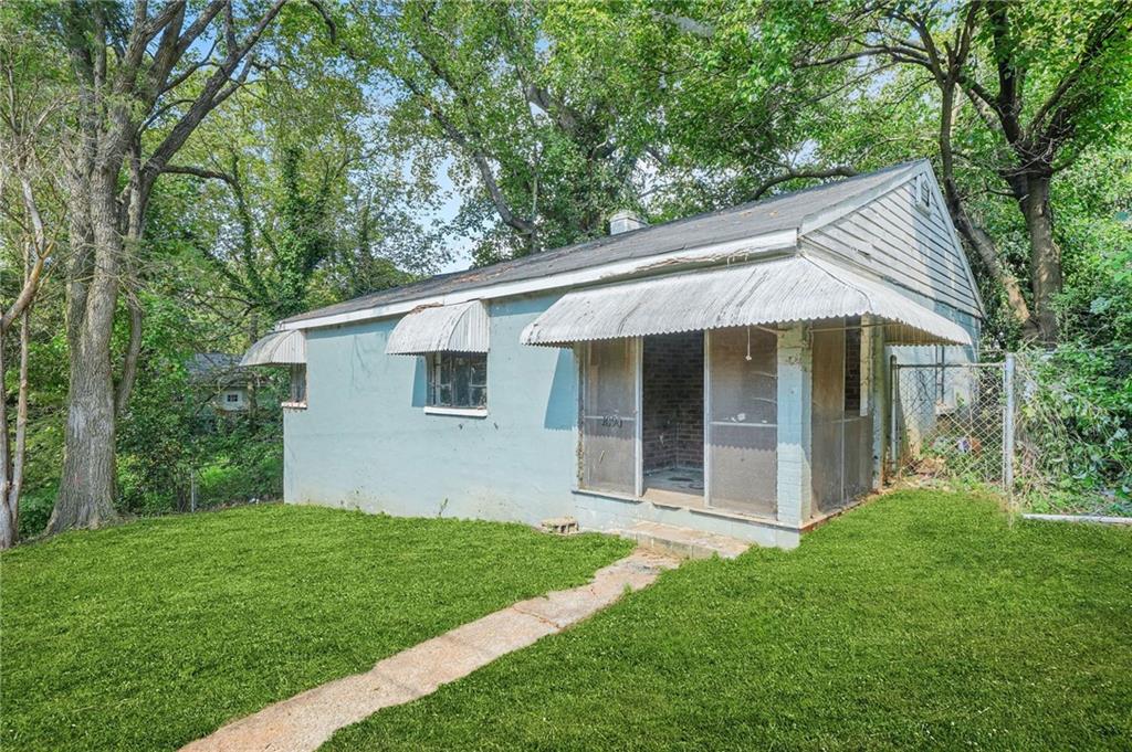 Invest Special Near Pittsburgh Yards!! This 2 bedroom, 1 bath ranch offers over 1,000 square feet and sits just a block and a half from the exciting Pittsburgh Yards development. With a solid foundation already in place, this home provides the perfect opportunity to build up, extend, or reimagine the existing structure. The property has been fully gutted, saving valuable time and expense on demolition. It's prime location places you minutes from the Atlanta Beltline, downtown, Mercedes-Benz Stadium, and the thriving West End community--making it an ideal candidate for a fix-and-flip, rental investment, or custom rebuild. Don't miss your chance to invest in one of Atlanta's fastest growing neighborhoods. Bring your contractor and schedule your tour today!