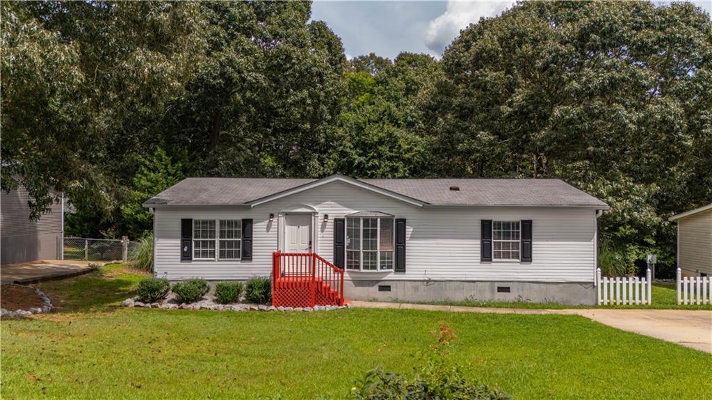 Welcome to your new home in the highly desirable Cherokee Bluff School District. This beautifully maintained 3-bedroom, 2-bath residence is tucked away in a quiet and established neighborhood, offering both comfort and convenience. The home has been thoughtfully updated with fresh interior and exterior paint, durable new LVP hardwood flooring, and updated light fixtures throughout. Both bathrooms have been fully remodeled, providing a clean and modern touch. The open and functional floor plan allows for easy living and entertaining. Step outside to a spacious back porch overlooking the private backyard, an ideal setting to enjoy quiet mornings, family gatherings, or evening relaxation. This home is truly move-in ready, combining tasteful updates with a peaceful setting, all within minutes of schools, shopping, and major highways.