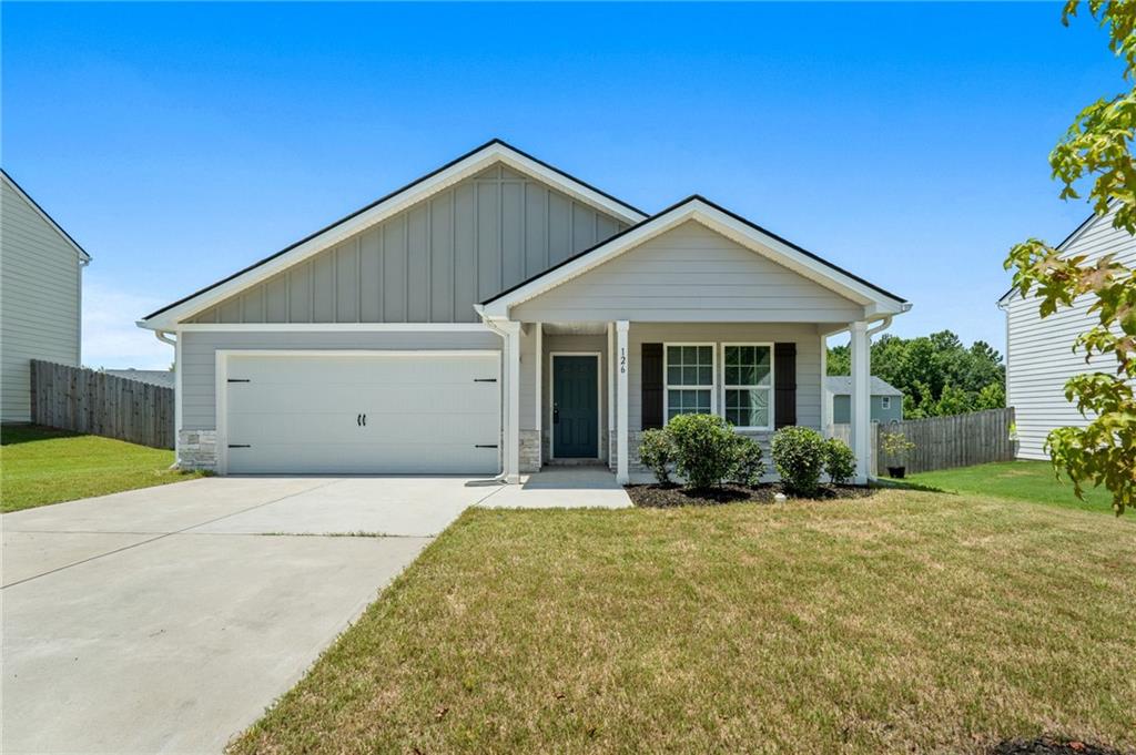 Welcome Home! Built less than 3 years ago, this charming 4-bedroom, 2-bath ranch still has that brand-new feel. From the moment you arrive, you’ll love the curb appeal—with a cozy covered front porch and a spacious 2-car garage.
Inside, the open-concept great room flows effortlessly into the modern kitchen. The spacious primary suite is tucked away for privacy and features a large walk-in closet and a luxurious private bath with dual vanity sinks. Three additional bedrooms and a second full bath offer flexibility for guests, a home office, or a growing family.
Impeccably maintained and truly move-in ready, this home qualifies for USDA 100% financing—a fantastic opportunity for eligible buyers looking to purchase with no money down. Don't miss out on this opportunity!