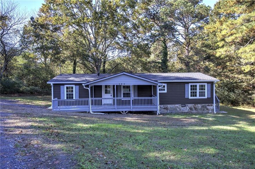 Welcome home to this beautifully updated 3 bed / 2 bath home nestled on almost 1 private acre. Brand new roof, heat / ac system, water heater, new paint, and flooring. Enjoy the large kitchen with all new appliances in this affordable and move in ready home.