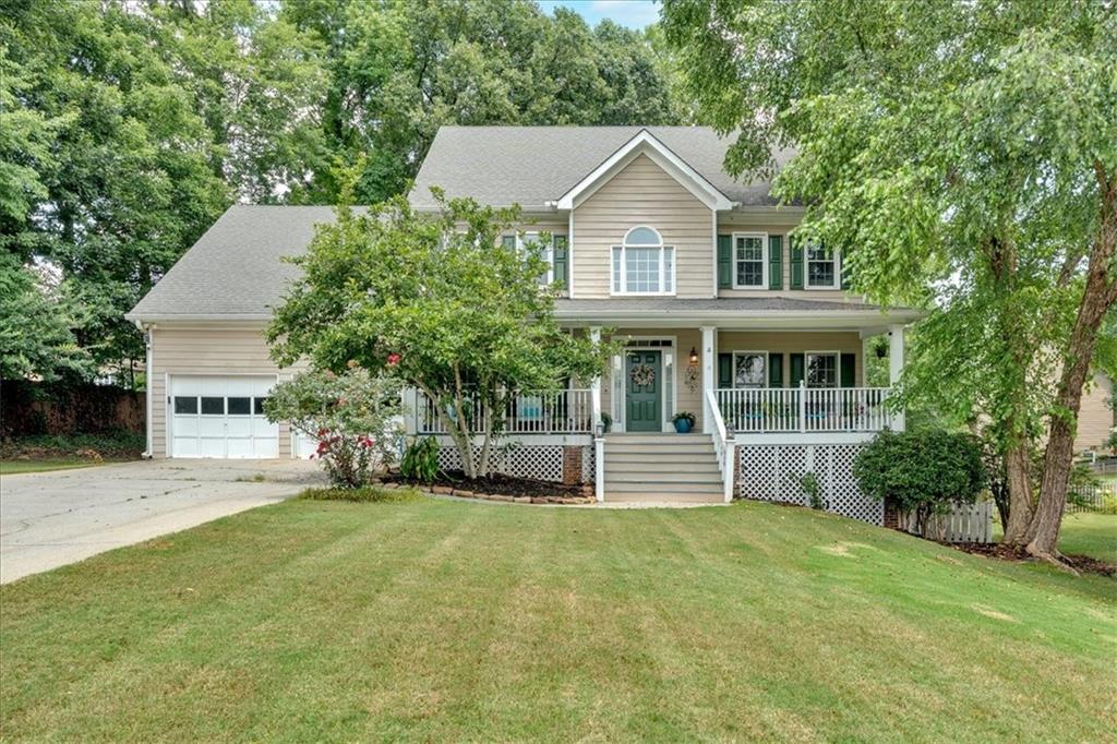 Are you looking for space? This beautiful colonial offers three levels of living space for flexibility and convenience! Upon entrance from the rocking chair front porch to the two-story foyer, you can feel the flow of this deluxe floor plan. The formal living and dining rooms just off the foyer are ideal for receiving and entertaining guests. These spacious rooms flow effortlessly into the grand family room, complete with fireplace and built-in bookcases, and the spacious kitchen with dining area. You will love the sensible design of the mud room area off the garage and kitchen: there is a HUGE walk-in pantry to accommodate your kitchen storage needs. The laundry room has plenty of room for folding or storing, and there is a powder room tucked away. Upstairs, you will find four bedrooms, plus a bonus room, which could function as a fifth bedroom. There is a separate back staircase leading from the mud room to the bonus room, making this an ideal space for guests, an office, or game room. The finished basement offers multiple finished spaces, including a full bath, which would work nicely for multi-generational living! There is also an abundance of unfinished space which can serve as extra storage or can be finished according to your unique vision! There is a spacious deck overlooking the nicely shaded backyard, which creates a great space for grilling and outdoor entertaining. A portion of the backyard is fenced, offering a perfect space for young kids or pets, but the yard extends far back beyond the fence line among the trees! This great residence is located in a popular swim and tennis community and is convenient to shopping and other conveniences.