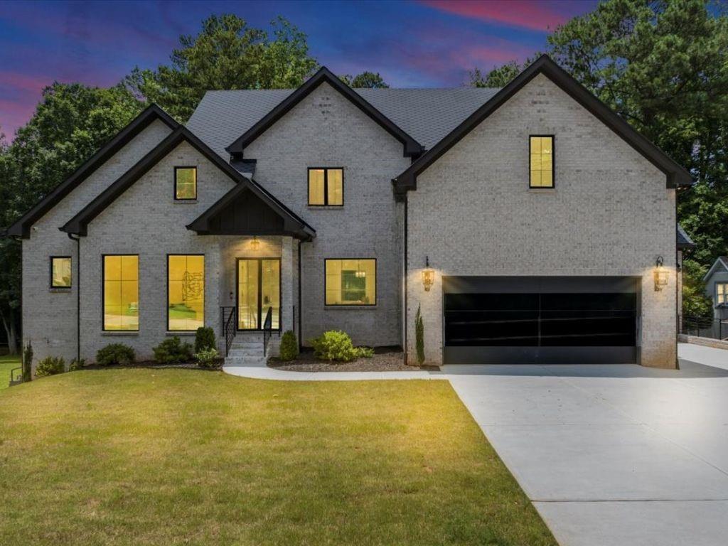 Luxury New Construction in Indian Hills Country Club. Experience elevated living at 3562 Clubland Drive—an all-brick custom estate in East Cobb’s prestigious Indian Hills Country Club, within the top-rated Walton High School district. This newly built masterpiece offers 5 spacious bedrooms, 5.5 designer baths, and a 3-car garage with sleek glass-and-steel doors. Inside, discover sunlit interiors with oversized windows, white oak flooring, handcrafted cabinetry, smart toilets, and soaring ceilings. The chef’s kitchen boasts double islands, premium appliances, and two walk-in pantries. The main-level owner’s suite features a spa-inspired bath with soaking tub, dual vanities, and separate his and her closets with bespoke wardrobe systems. Enjoy four fireplaces, ambient lighting, a covered rear porch with fireplace, and a private backyard—perfect for entertaining. The terrace level hosts a patio and unfinished daylight basement prepped with bath, plumbing, and electrical stubs, that offers a blank canvas for future customization and seamless expansion. Upstairs features four generously sized bedrooms, each thoughtfully appointed with its own en-suite bath and custom closets for elevated comfort, privacy, and organization, boutique-style laundry suite, and a versatile flex space ideal for a media lounge or playroom. Located minutes from Indian Hills Golf Course, shopping, and dining. From the striking entrance to the extra-wide hallways, every inch of this luxury residence has been thoughtfully designed to elevate your lifestyle and sets the stage for hosting distinguished guests or relaxing with family. Don't miss the opportunity to make this extraordinary property your Home Sweet Home! Schedule your private tour today.