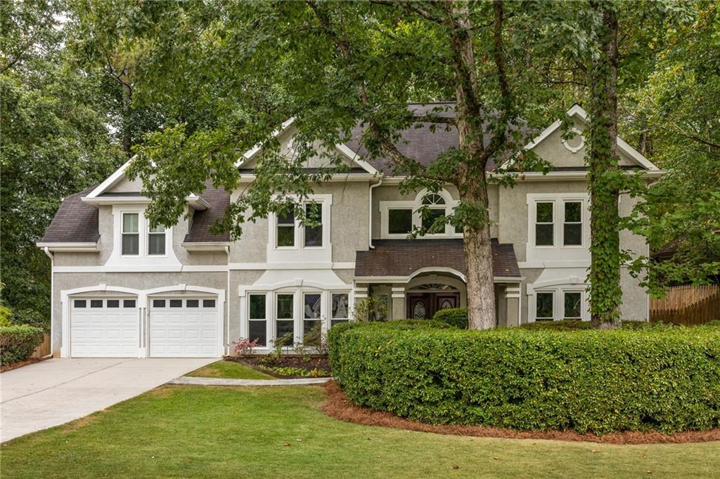 Welcome to East Cobb with a Roswell address — where charm meets community. This home sits on nearly half an acre in a beloved swim and tennis neighborhood, with space inside and out designed for how you really live.
Step inside and you’ll notice the details right away — wood floors, updated lighting, plantation shutters, and a kitchen that looks out to the backyard so you’re always connected to the heart of the home. Upstairs, the primary suite feels like a retreat, with double walk-in closets and a spa-like bath featuring dual vanities, a soaking jetted tub, and separate shower. Three more bedrooms and beautifully refreshed full baths offer plenty of room for family or guests, while the oversized bonus room above the garage is ready to flex with you — a playroom, a media room, or a tucked-away office.
Out back, the fenced yard stretches wide with a large deck that’s made for entertaining, unwinding, or watching kids and pets run free. Practical touches like a tankless water heater, double-pane windows, a rare double driveway, and extra garage storage make daily life even easier.
And then there’s the neighborhood — swim, tennis, a clubhouse, playground, even a pond for fishing — it’s the kind of place where neighbors know each other. Beyond the neighborhood, Roswell’s natural beauty is at your doorstep. Morning crews glide down the Chattahoochee River as the sun rises, while the 7-mile Riverwalk invites you to bike, jog, or stroll along the water. The wooded hiking trails at Vickery Creek and the Chattahoochee Nature Center offer endless ways to explore and connect with the outdoors.
All just minutes from Downtown Roswell’s restaurants, shops, and festivals, plus top-rated East Cobb schools: Tritt Elementary, Hightower Trail, and Pope High. This is more than a house — it’s the backdrop for your next chapter, in a community that has it all.