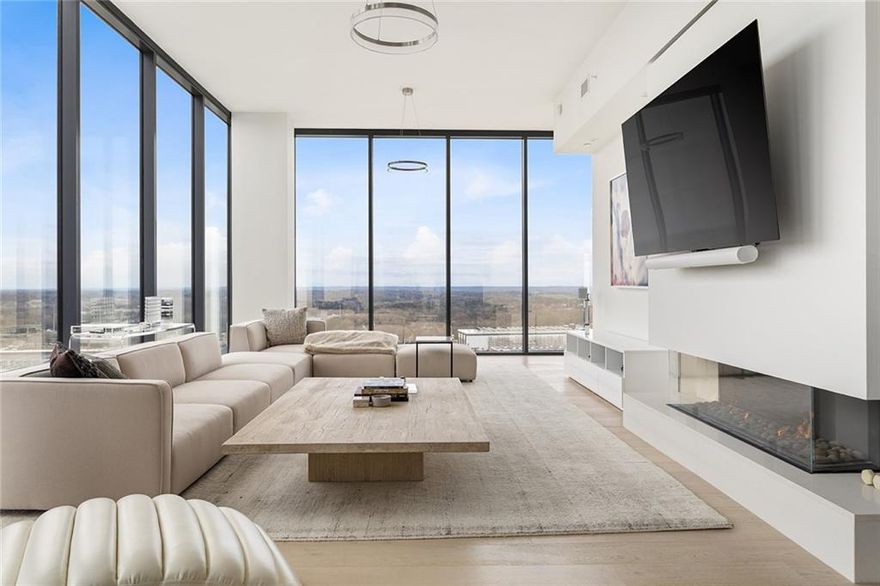 Welcome to this LUXURY FURNISHED PENTHOUSE with unparalleled views and location in the heart of West Midtown. This 4 year young TOP FLOOR 2 BR/3 Full BA 2,369 square feet unit includes a Flex Space perfect for a home office, den or workspace which could also easily be converted into a 3rd Bedroom when purchased. 12’ tall ceilings provide a grand sense of space with floor-to-ceiling windows on every exterior wall bathing the home in natural light and providing sweeping, panoramic views of the city and westside Atlanta. A European-style kitchen is brought to life with modern soft-close custom cabinetry with undermount lighting, quartz countertops with a waterfall center island which seats 4, tile backsplash and stainless steel Kitchen Aid and Whirlpool appliances including a separate beverage center for wine, beer or other libations. A dining area with a large wrought-iron double tiered chandelier is located directly off of the kitchen with access to the exterior balcony. The thoughtfully designed open concept living space combined with high end furnishings and art mixes Old World and New World aesthetics making this an entertainer’s dream while also inviting ease and relaxation for everyday living. Beautiful designer finishes throughout include wide plank LVP floors, a designer lighting package including upgraded fans, and a remote controlled sleek linear fireplace. Multiple high definition flat screen TV’s are mounted conveniently throughout including the primary living space, owner’s suite and kitchen. The spacious owner’s suite features views of downtown and has a large walk-in closet. The owner’s bath features oversized tile flooring, a double vanity with quartz countertops, an LED mirror, walk-in glass surround shower and modern soaking tub. The spacious secondary bedroom with views of the westside includes a walk-in closet and ensuite bathroom with oversized tile flooring, an LED mirror and a tub/shower combo. The 3rd full bathroom located near the entry foyer features the same high end finishes. Additional features of this top-floor penthouse include a convenient walk-in laundry room with oversized tile flooring and front loading LG washer and dryer, ample storage space in multiple closets throughout the unit and 2 deeded parking spaces. Seven88 stands apart in this historic post-industrial district only minutes from Atlanta’s best restaurants, retail and entertainment. Extraordinary amenities include a gated parking garage, 24-hour concierge, saltwater pool & whirlpool spa, fitness & yoga center, outdoor grilling areas, club room with demonstration kitchen, billiards and lounge, bike storage, and smart delivery lockers with cold storage for food deliveries. Also listed For Sale for $1,425,000 FMLS#7591612. The Property is currently leased and will be available for showings starting July 10th.