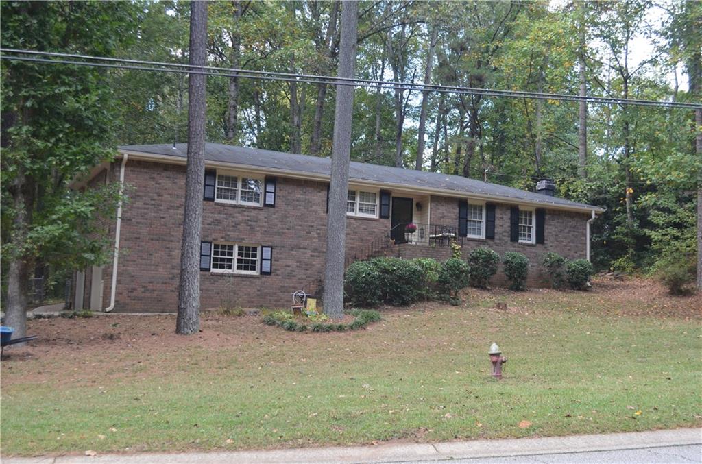 Updated brick home in desirable school district. New kitchen, large living room, sitting area in master bedroom. Fenced back yard with large enclosed are for pets.