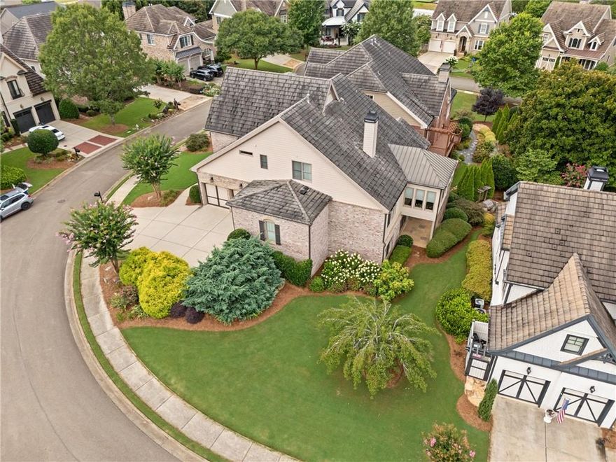 Discover exceptional value in this enchanting home at a newly reduced price of $995,000. Nestled within the storybook-like Cottages at Creekstone, this residence offers a perfect blend of charm and practicality. Adjacent to Creekstone Estates, enjoy shared amenities including hassle-free lawn maintenance.
This residence stands out not only for its unique beauty but also for its superior, energy-efficient construction featuring durable concrete roofs. The Primary on Main home showcases exquisitely appointed rooms with ample space to cater to your lifestyle needs.
Crafted with immaculate attention to detail, this four-sided brick home boasts a spacious chef's kitchen equipped with SubZero and Thermador appliances, accentuated by spectacular crown molding and coffered 11 ft. ceilings. Gleaming hardwood floors (refinished just 2 years ago!!) span throughout, leading to a vast finished basement with countless storage options, a kitchenette with granite countertops and private entrance, and a 3-car garage with epoxy flooring. Additional features include three accessible attic storage areas.
Families will appreciate the top-tier local schools and the extensive Creekstone Estates amenities, including a Jr Olympic pool, tennis courts, pickleball, a clubhouse, playground, fishing, and organized sports and activities for all ages. Embrace a country club lifestyle in an idyllic setting—this home and community offer an unrivaled living experience in Forsyth County. Don’t miss this opportunity to own a piece of paradise at an incredible price.