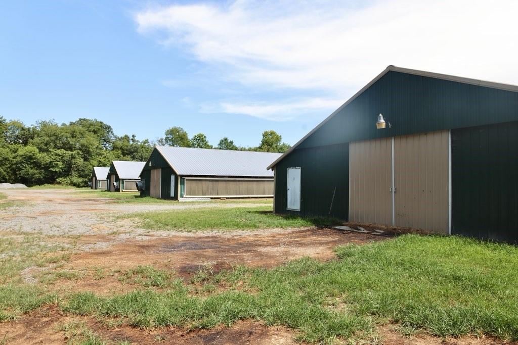 Excellent Broiler farm located in Northwest Georgia in Murry County near Resaca, Chatsworth, and Calhoun, Georgia. Includes 4 - 40'x600' Broiler houses that are newly renovated and fully up to date. Includes 24 acres, a 40'X120' litter barn, and a brand new 14x60 2 bedroom 2 bath mobile home; The broiler farm includes top of the line equipment including Rotem controllers and communication systems, Grower Select feeders, Val drinkers, Spaceray heaters, and more. The farm is set up with Solar Panels which saves on power bills. Heaters are fueled by Natural Gas. This is a first class poultry operation! Great Poultry farm in Northwest Georgia!