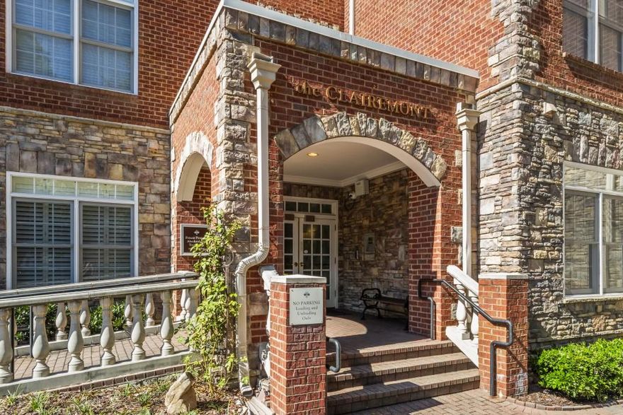 Beautifully curated, character-filled condo in one of Decatur's most desirable communities. This first-floor home sits one level above ground, offering elevated privacy, abundant natural light, and the convenience of main-level living. Thoughtful architectural details-10' ceilings, stained-in-place hardwood floors, plantation shutters, new windows (2025), and classic millwork-create a warm, welcoming feel that's perfect for simplifying without sacrificing quality or style.  The fireside living room opens to a spacious covered patio, creating an easy indoor-outdoor flow that lives like a much larger home. The flexible dining room with tray ceiling functions equally well as a home office or library, giving you the ability to right-size your spaces while keeping the rooms you still love to use. The updated kitchen includes 2024 stainless appliances, granite counters and backsplash, a gas range with hood, an oversized island with seating, built-in wine rack, a walk-in pantry, and ample cabinetry with Rev-A-Shelf systems-ideal for staying organized with ease.  A keeping room with a decorative fireplace and custom built-ins offers a comfortable additional living area, perfect for morning coffee, reading, or intimate gatherings.  The generous primary suite features a trey ceiling, seating area, California Closet system, and a renovated bathroom with a quartz double vanity, upgraded lighting, and a newly refinished shower with upgraded tile and plumbing fixtures. An additional storage closet can be converted into a second clothes closet for even more wardrobe space. The secondary suite includes a custom Murphy bed with an integrated desk and storage, a California Closet system, and a spacious hall bath with linen storage-perfect for guests without giving up a dedicated office or hobby room.  Practical upgrades include a true laundry room with cabinetry, upgraded lighting, enhanced built-ins, a Phantom screen, and two deeded covered parking spaces.  Residents enjoy a swimming pool, fitness center, club room, media room, library, and dog park, along with an active HOA offering book clubs, Mahjong, Bunco, weekly happy hours, and more-ideal for those seeking connection and community with low-maintenance living. Exceptional location close to the Decatur Square, Glenlake Park, restaurants, shops, walking paths, and MARTA. A rare opportunity to enjoy simplified, well-appointed living in the heart of Intown Decatur.