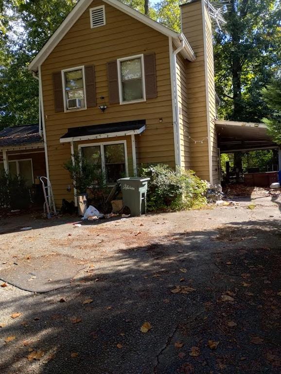 This move-in ready home is waiting for its next owner. It has solid bones and plenty of potential for someone to make it their own. The property features a carport and an enclosed porch, offering extra space to enjoy. Conveniently located less than 10 minutes from Marietta Square, you’ll enjoy easy access to local shops, dining, parks, and top-rated schools. Don’t miss out on this well-located home with so much to offer!