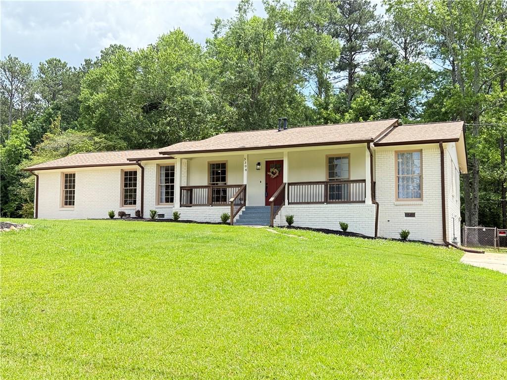 Exquisitely renovated and thoughtfully designed, this 3-bedroom, 2-bathroom ranch in Marietta offers the perfect blend of elegance and comfort. From the moment you arrive, the home’s charm is undeniable, with fresh exterior paint, a new mailbox, and a meticulously cleaned yard that enhances its curb appeal. Inside, every detail has been elevated to reflect modern sophistication. The open-concept layout features brand-new LVT flooring, new carpet in designated areas, full interior paint, and an abundance of natural light that highlights the quality craftsmanship throughout. The gourmet kitchen is a showpiece, boasting quartz countertops, new appliances, stylish hardware, and custom lighting—ideal for both everyday living and entertaining. The spa-like primary suite includes a generous walk-in closet and a beautifully remodeled bathroom with a tiled walk-in shower, double quartz vanities, and sleek new fixtures. Secondary bedrooms are spacious and bright, with access to another fully renovated bathroom. Additional upgrades include new doors and trim, new vanities, light and plumbing fixtures, and a new water heater. Located near schools, shopping, and dining, this move-in ready Marietta gem offers a rare opportunity to own a home where refined design meets everyday comfort.