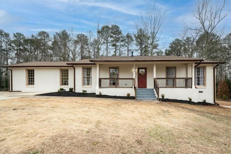 Exquisitely renovated and thoughtfully designed, this 3-bedroom, 2-bathroom ranch in Marietta offers the perfect blend of elegance and comfort. From the moment you arrive, the home’s charm is undeniable, with fresh exterior paint, a new mailbox, and a meticulously cleaned yard that enhances its curb appeal. Inside, every detail has been elevated to reflect modern sophistication. The open-concept layout features brand-new LVT flooring, new carpet in designated areas, full interior paint, and an abundance of natural light that highlights the quality craftsmanship throughout. The gourmet kitchen is a showpiece, boasting quartz countertops, new appliances, stylish hardware, and custom lighting—ideal for both everyday living and entertaining. The spa-like primary suite includes a generous walk-in closet and a beautifully remodeled bathroom with a tiled walk-in shower, double quartz vanities, and sleek new fixtures. Secondary bedrooms are spacious and bright, with access to another fully renovated bathroom. Additional upgrades include new doors and trim, new vanities, light and plumbing fixtures, and a new water heater. Located near schools, shopping, and dining, this move-in ready Marietta gem offers a rare opportunity to own a home where refined design meets everyday comfort.